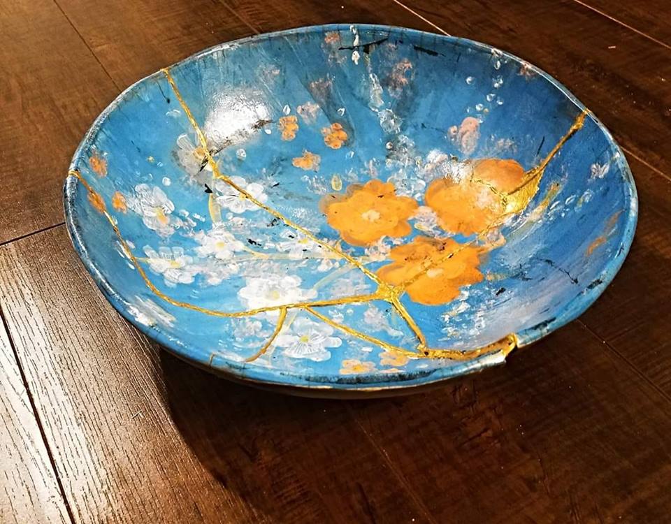 the art of kintsugi - a broken bowl repaired as an artform